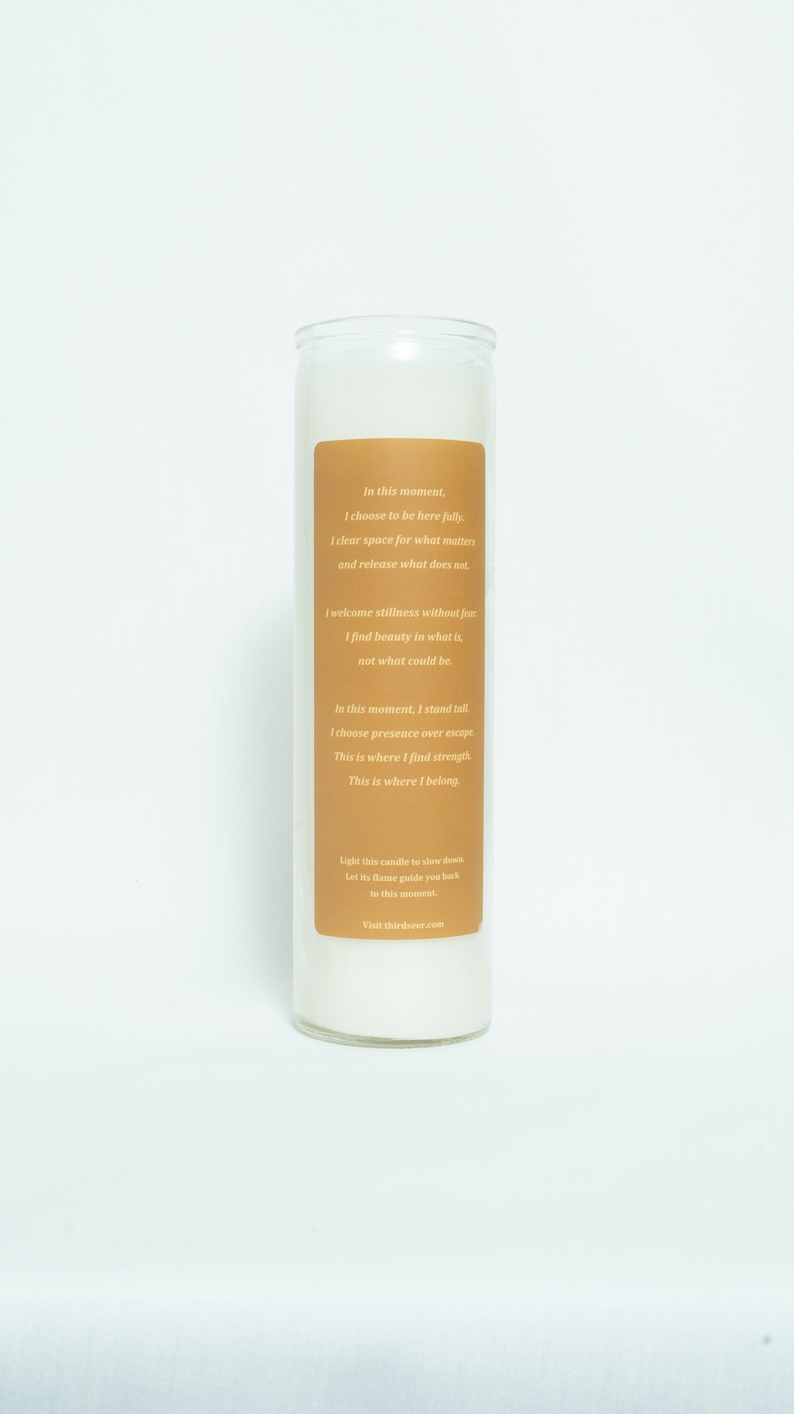 Candle with a label on a white background