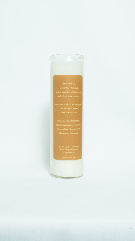 Candle with a label on a white background